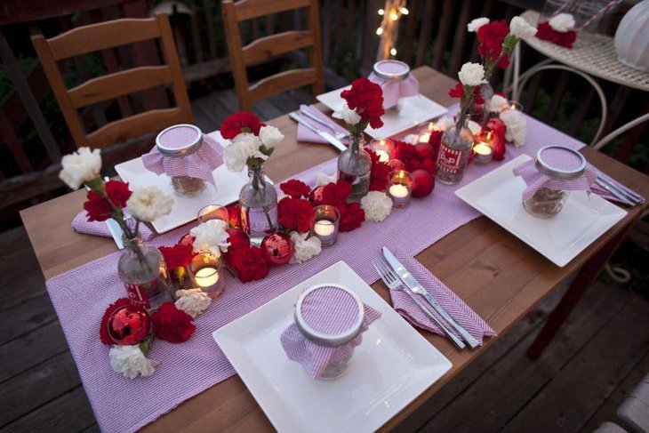 A red and white floral Christmas tablescape