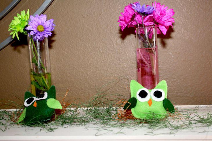 Adorable green owl centerpieces with flowers