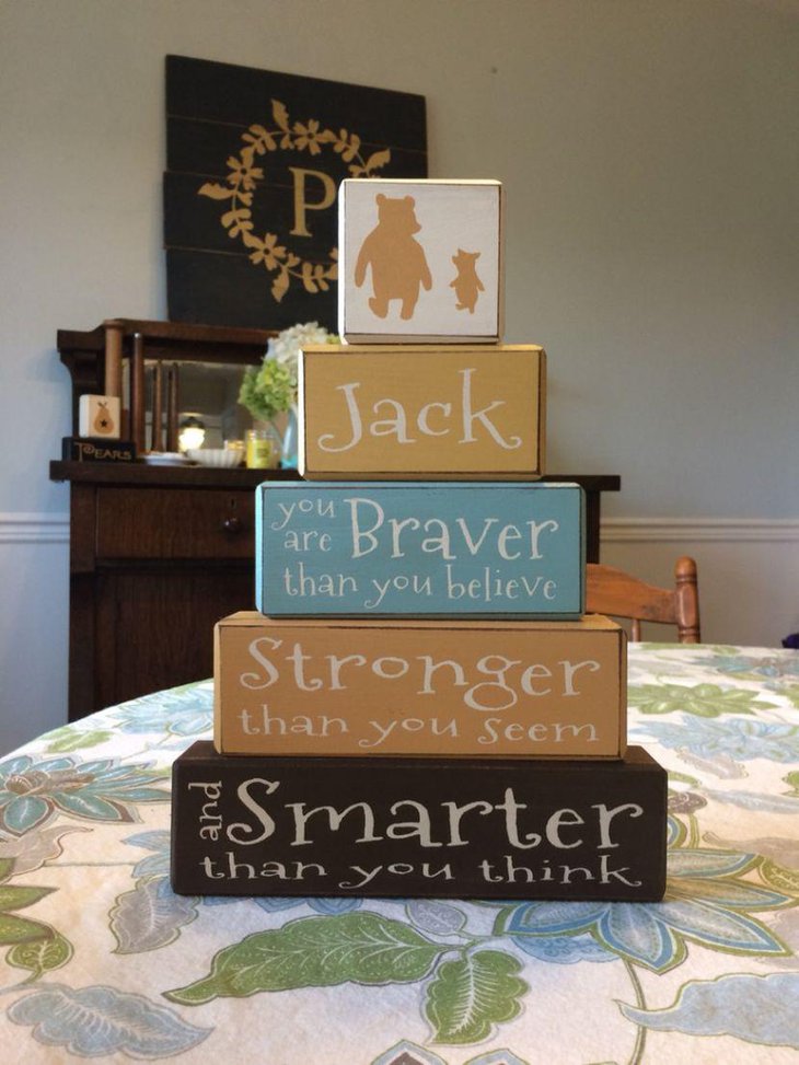 Adorable Winnie The Pooh layered box centerpiece idea for baby shower