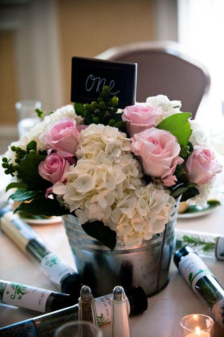 Amazing flowers in Galvanized Buckets As Wedding Table Centerpiece
