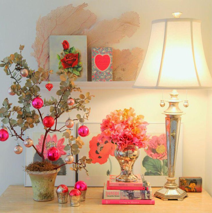 Amazing tree with hanging balls and books Valentines centerpiece