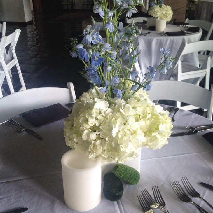 Amazing white and purple floral spring table centerpiece