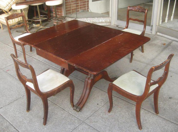 Antique Duncan Phyfe drop leaf dining table set