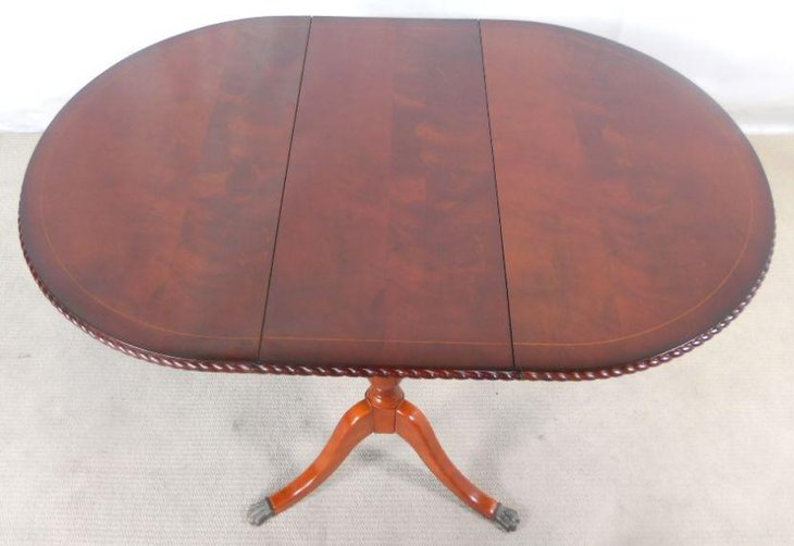 Antique oval mahogany drop leaf dining table design