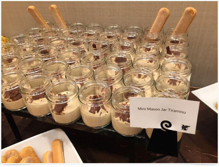 Appetizing dessert table setup with mason jars