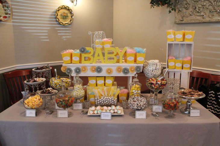Awesome dessert table idea for yellow and grey baby shower