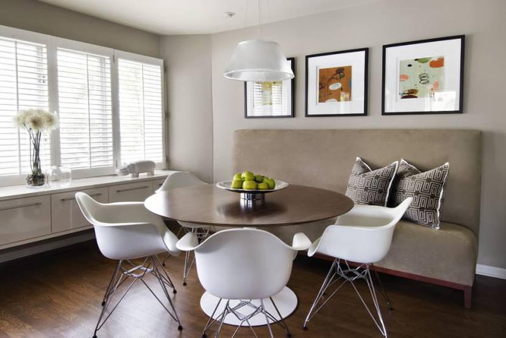 Banquette Breakfast Nook With Beautiful Artwork