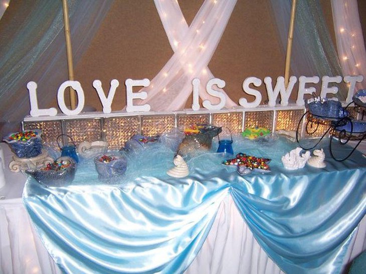 Beach themed candy buffet wedding table centerpieces