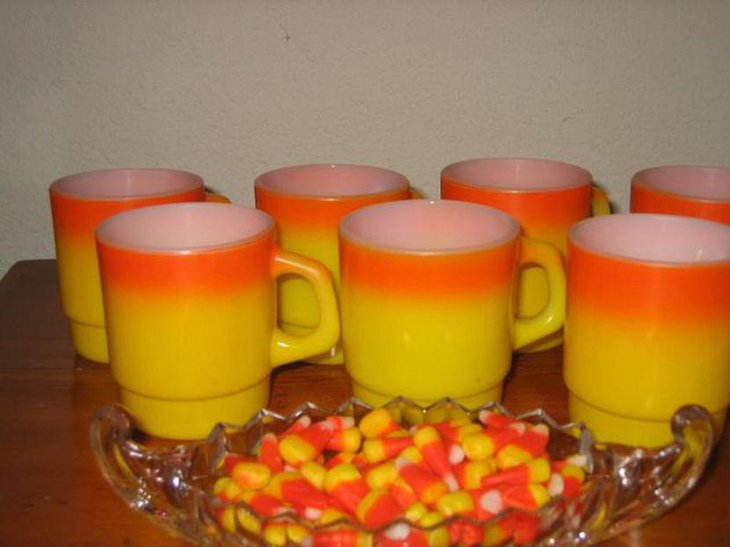 Beautiful candy corn coloured mugs for kids Halloween table decor