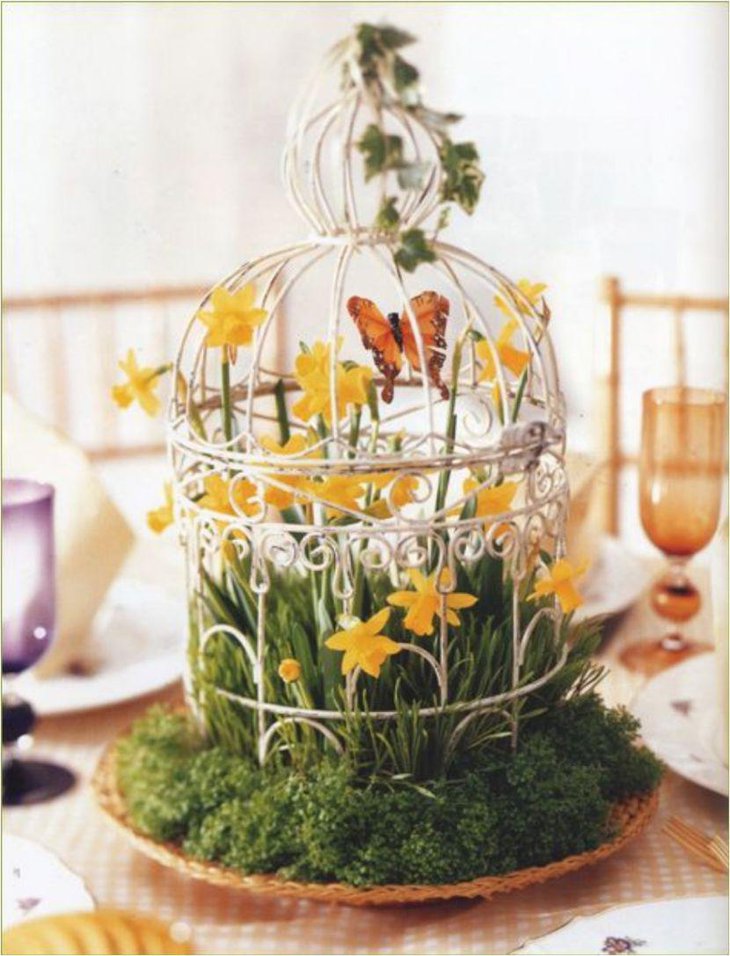 Beautiful DIY birdcage centerpiece with butterfly and flowers