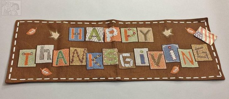 Beautiful Fall Colors and Happy Thanksgiving Spelled in Multi Color Table Runner