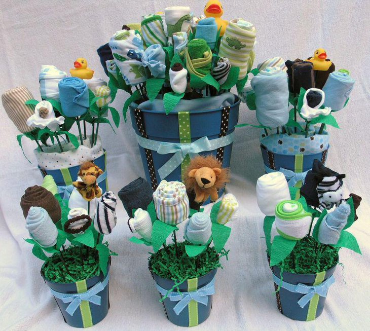 Beautiful jungle theme baby shower decorations with cloth and stuffed animal toys
