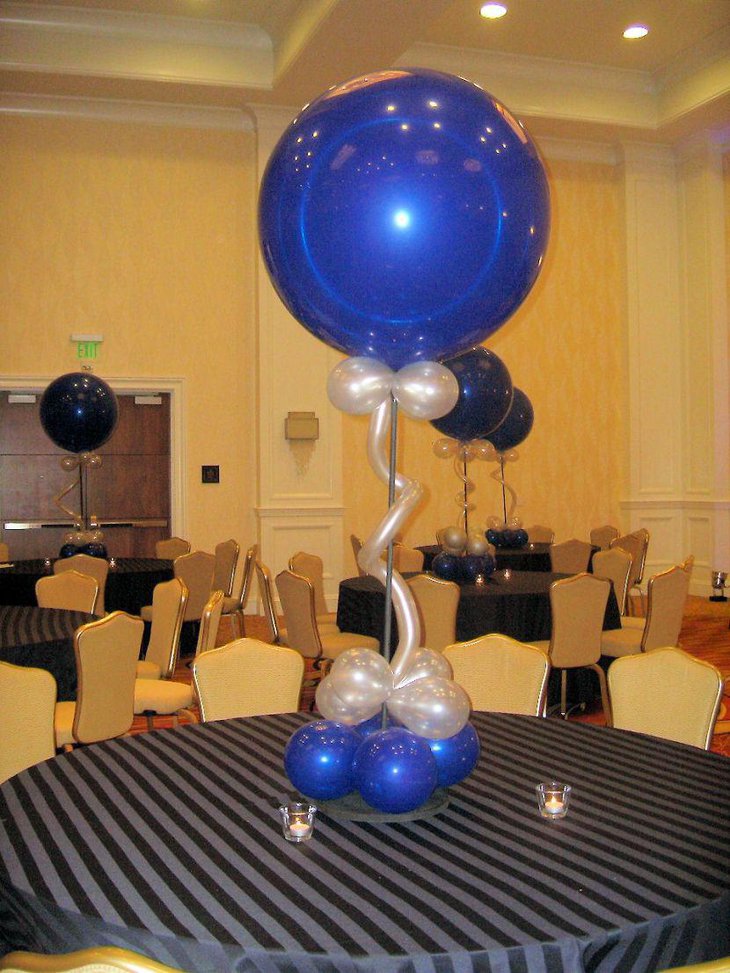 Big blue graduation centerpiece with balloons