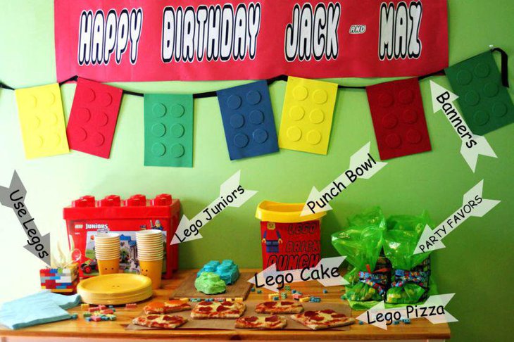 Birthday table decorations with Lego punch bowl Lego cake and Lego cups