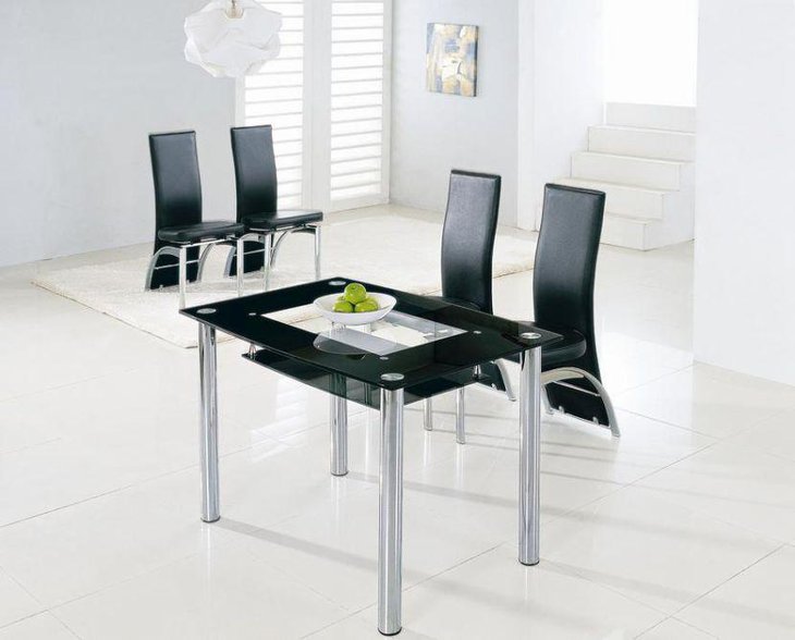 Black coloured small glass dining table set