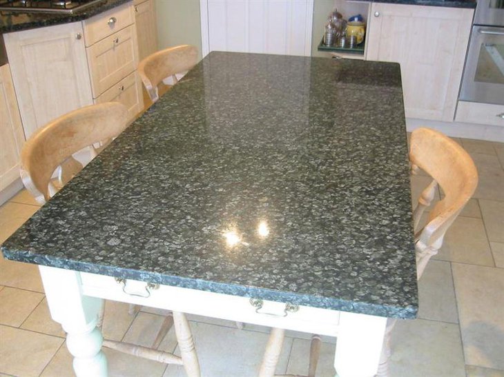 Black patterned granite top kitchen table
