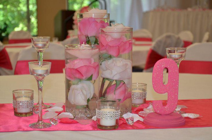 Bling candle centerpieces for wedding table in pink and white accents