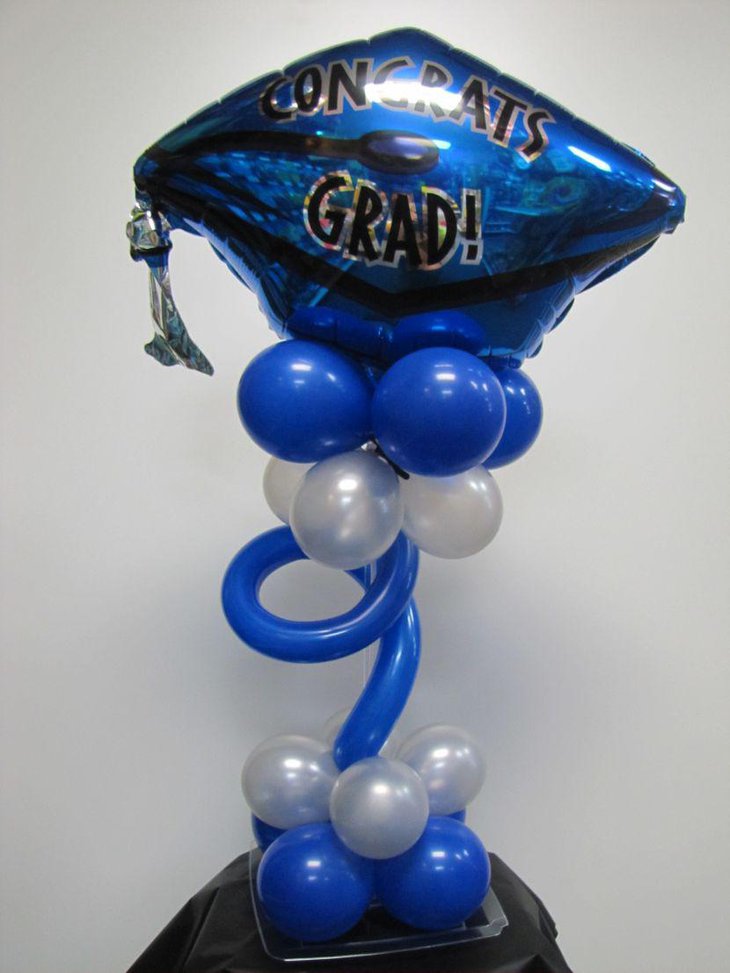 Blue and white balloon graduation centerpiece