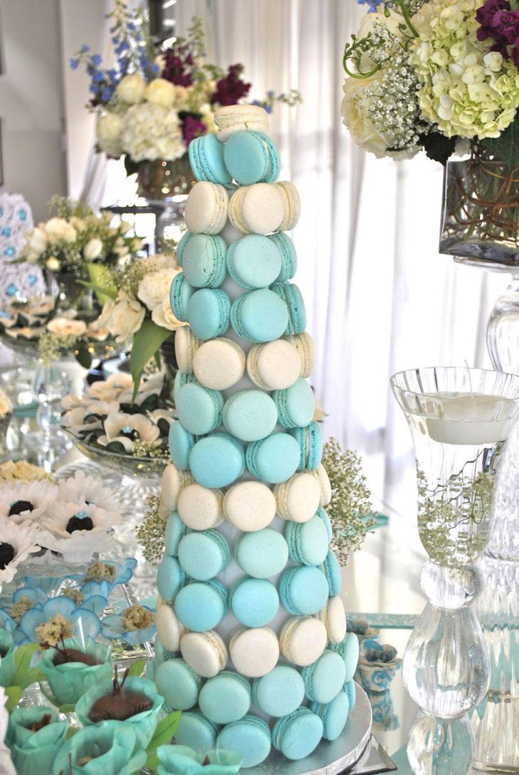 Blue and white macaron centerpiece on a sweet 16 birthday table