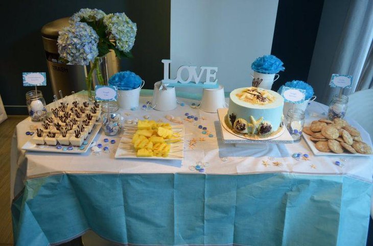 Blue beach themed bridal dessert table