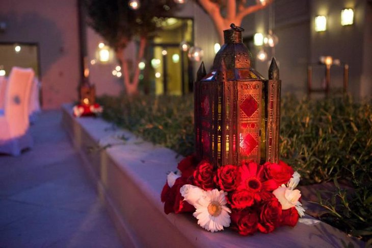 Candle Lit Lanterns and Floral Centerpieces