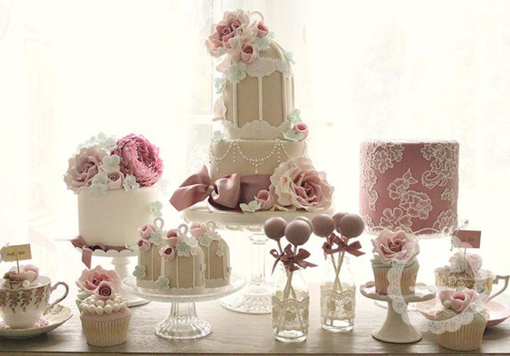 Charming European pink and white themed dessert table