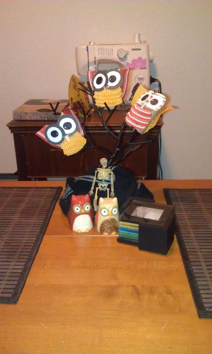Charming Halloween tree centerpiece with owls and skeleton