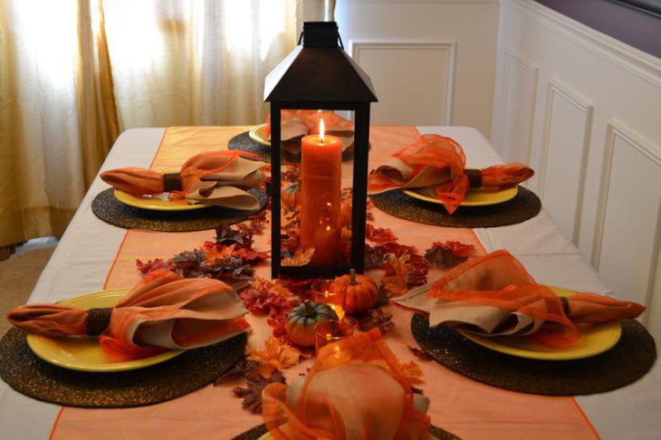 Charming Table Centerpiece Design Including Moroccan Lanterns With Orange Candle Plus Small Pumpkin