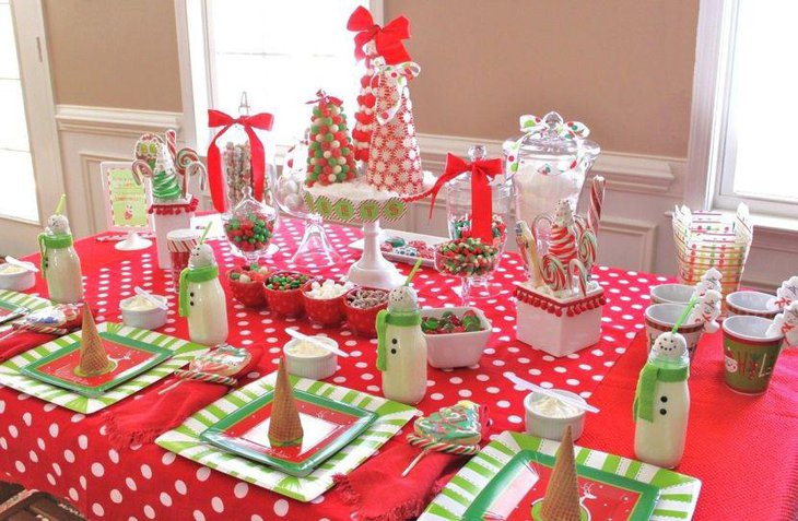 Christmas dessert table decor with candy cones and bottles