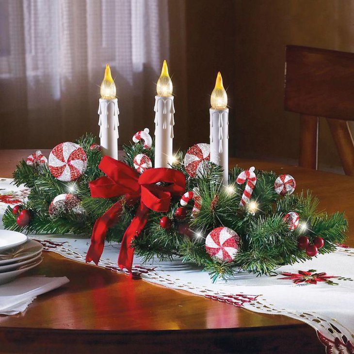 Christmas Table Decor With Ornamental Candles Bow and Ornaments