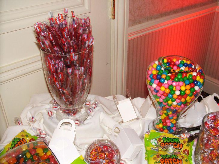 Colourful DIY candy table idea with glass jars