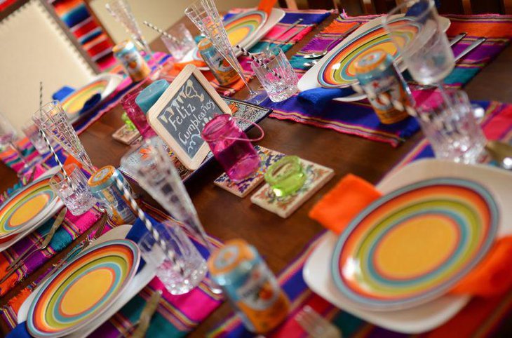 Colourful Mexican themed birthday party table setting