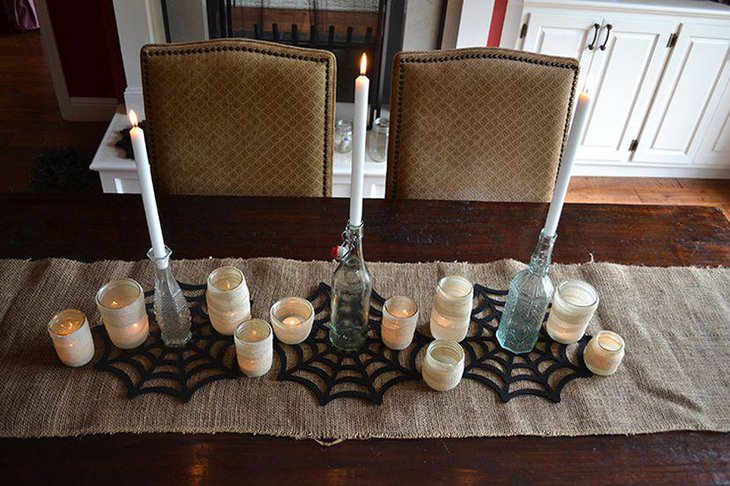 Cool DIY glass and candle centerpiece for Halloween table