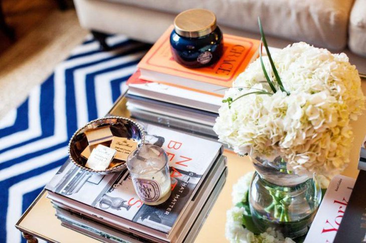 Cool piled up books on coffee table