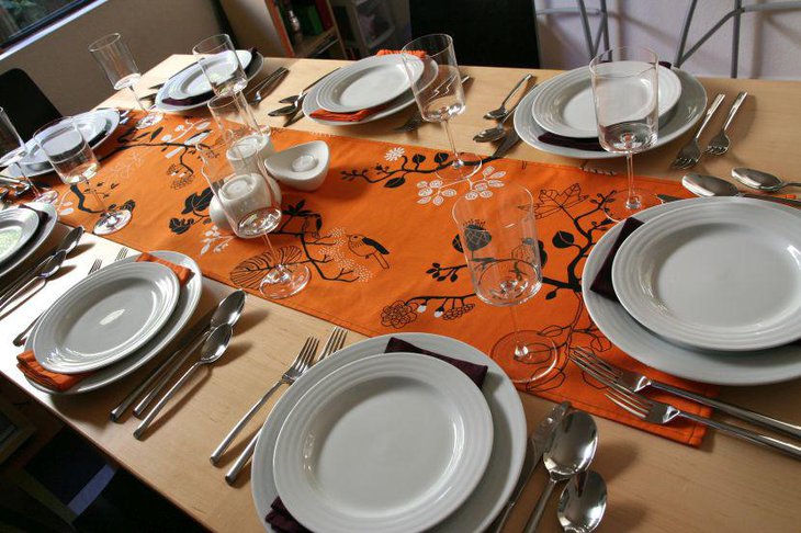Creatively printed orange colored table runner for Thanksgiving