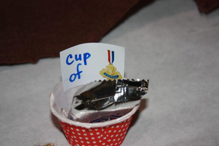 Cup of Courage favor cup on retirement party table