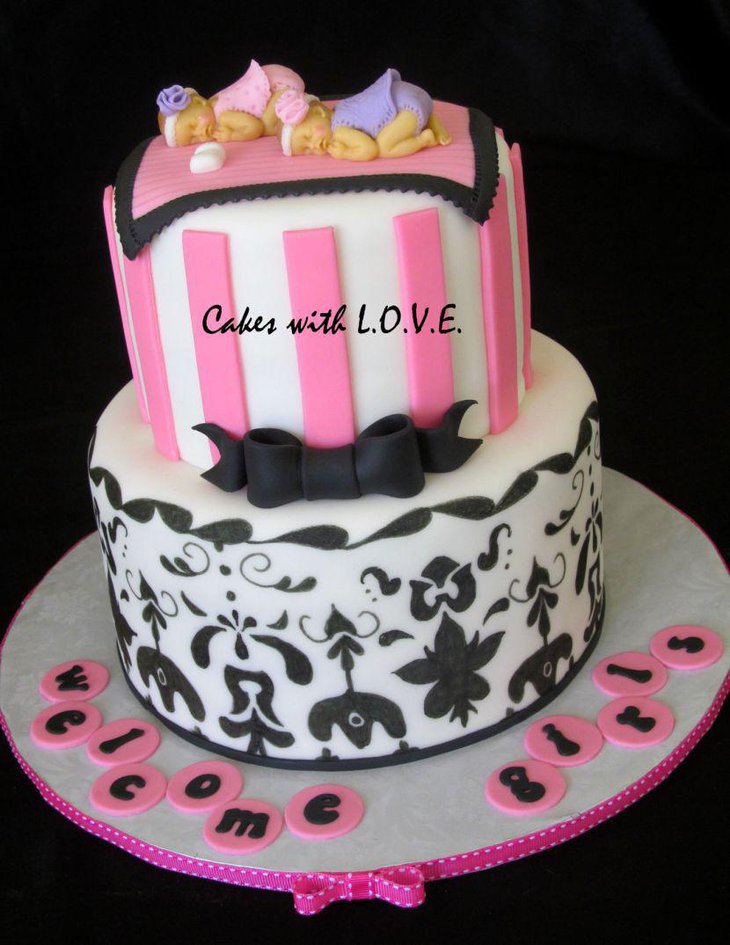 Cute baby shower cake for twin girls