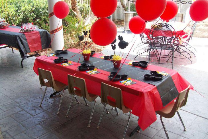 Cute black and red themed Mickey Mouse birthday guest table