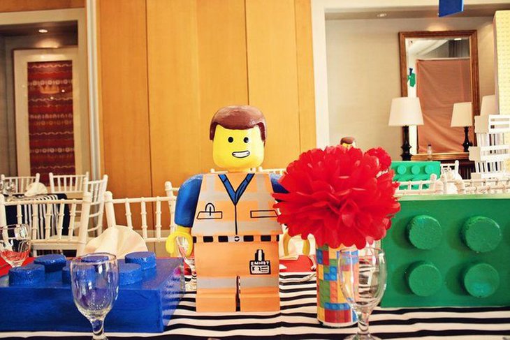 Cute Emmet and Lego blocks as birthday party table decorations
