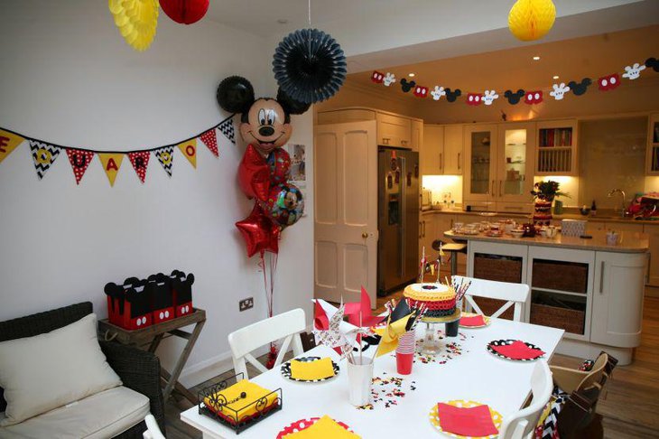 Cute first birthday table decor with Mickey Mouse theme