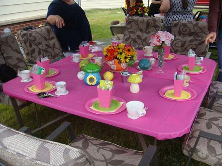 Cute floral centerpiece on girl baby shower table
