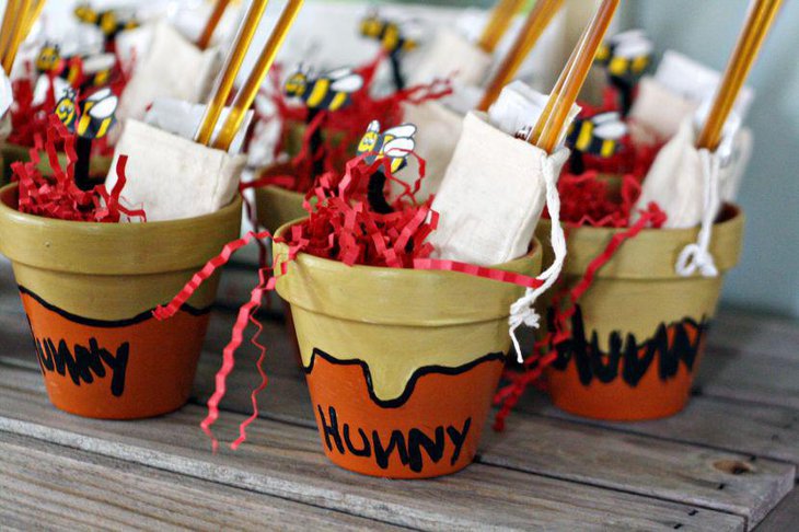 Cute hunny pot favors for Winnie The Pooh baby shower