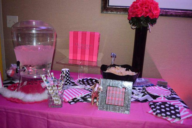 Cute pink birthday table decor for a sweet 16 party