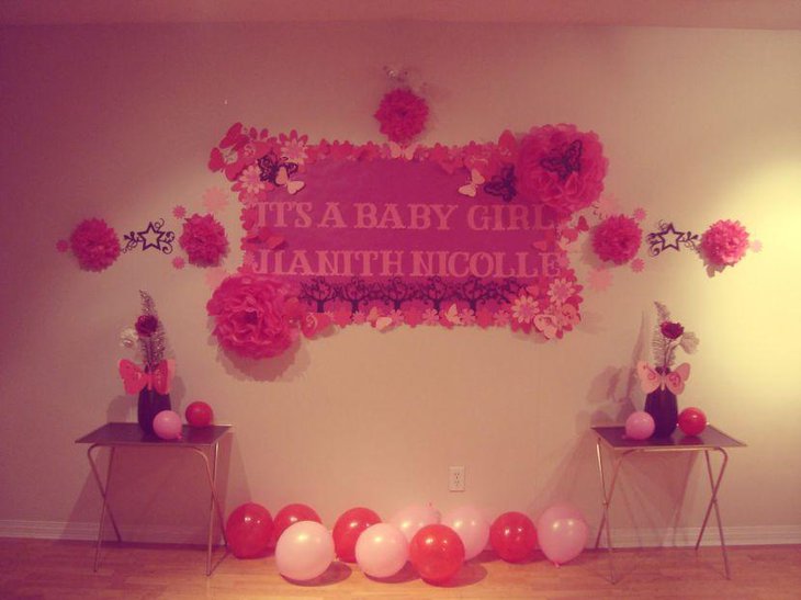 Cute pink butterfly and flower themed girl baby shower decor