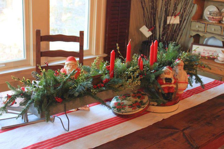 Cute Santa figurines decorated to lend fun to this table
