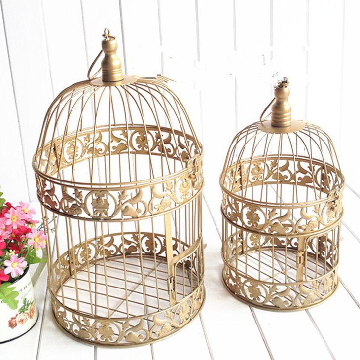 Decorative golden birdcage centerpiece