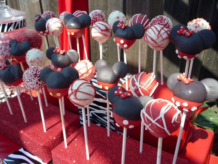 Delicious Minnie Mouse cake pops on candy table