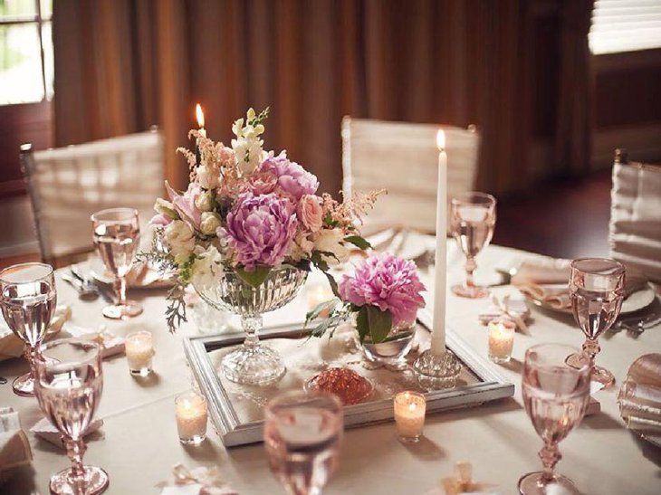 Elegant pink and white floral centerpiece for wedding tables