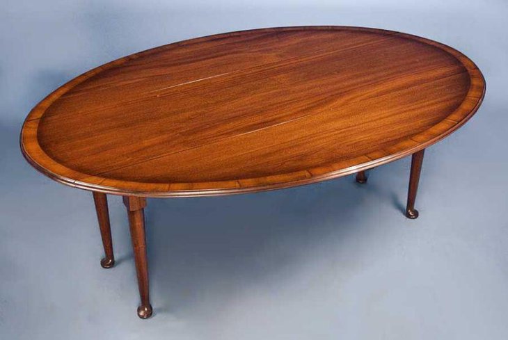 English antique mahogany drop leaf dining table
