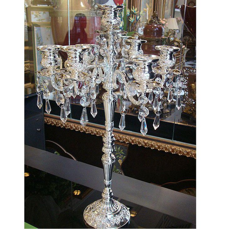 Exquisite silver candelabra centerpiece with hanging crystals
